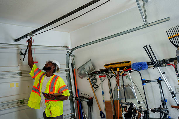 Professional Garage Door Off Track Repair technician working in Port Washington North, NY